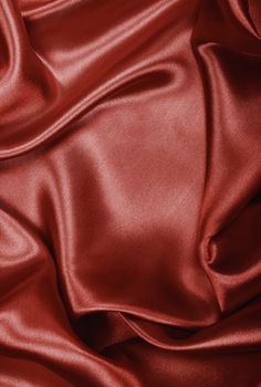 Smooth elegant brown chocolate silk or satin texture can use as background 