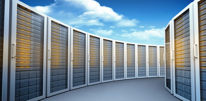 Server towers against bright blue sky with clouds