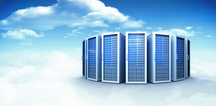 Server towers against bright blue sky with clouds