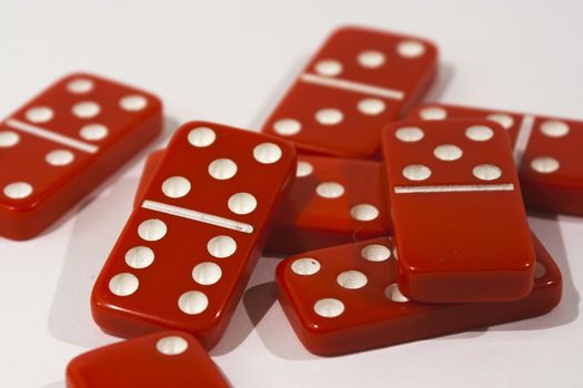 Red dominoes on a white background