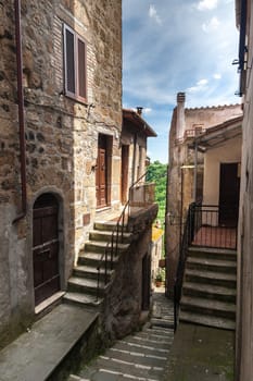 Classic narrow street of the old city in Italy