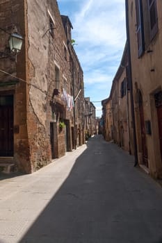 Classic narrow street of the old city in Italy