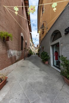 Classic narrow street of the old city in Italy