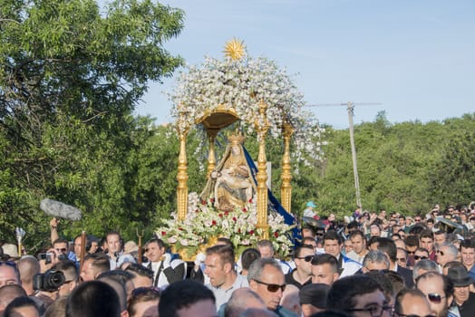 LOULE,PORTUGAL-APRIL19, 2015: man are bringing the 600 kg heavy statue of the Holy Maria to the church in Loule on April 19 2015,This proccesion called Festa da Mae Soberana is 14 days after easter