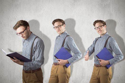 Nerd with notebook against white and grey background