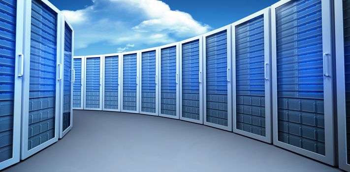 Server towers against bright blue sky with clouds