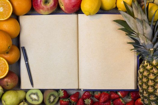 Selection of Fresh Fruit with an Open Recipe Book - Blank Pages - Space for Text