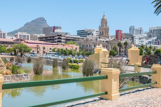 CAPE TOWN, SOUTH AFRICA - DECEMBER 18, 2014:  Moat of the Castle of Good Hope with the central business district and Lions Head in the back