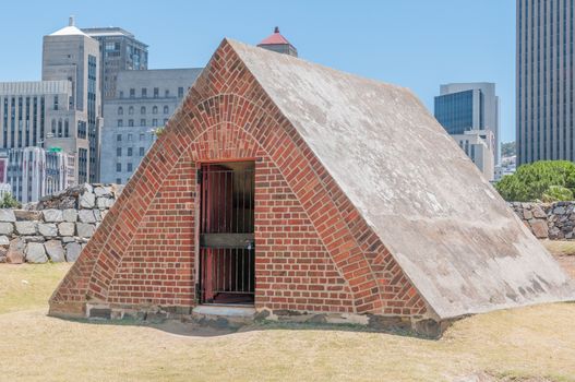 CAPE TOWN, SOUTH AFRICA - DECEMBER 18, 2014:  The view towards the central business district seen from the entrance to the Castle of Good Hope with the powder magazine in front