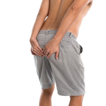 Man holding his butt and having diarrhea, isolated on white background.