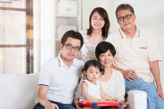 Happy family portrait. Asian multi generations lifestyle at home.