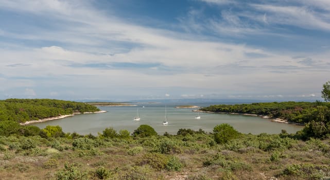 Istria, Croatia. Beautiful small harbor in green Bay