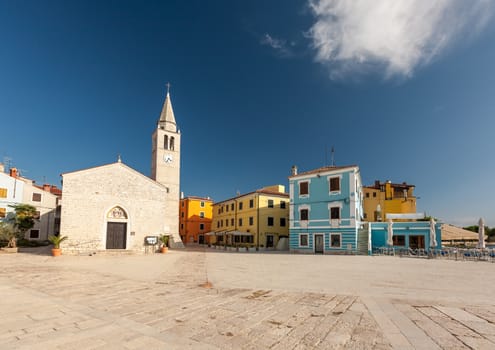 Waterfront square in Fazana. The old church