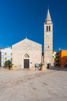 Waterfront square in Fazana. The old church