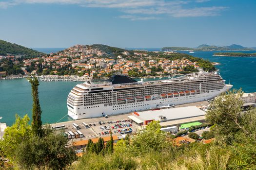 Dubrovnik, Croatia - September 11, 2009: Big Cruising ship of the MSC Cruises standing on the pier near Croatian town Dubrovnik in 11.09.2009