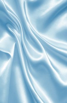 Smooth elegant blue silk or satin texture can use as background