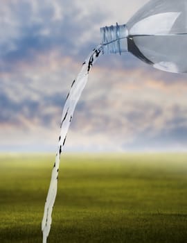 Pouring water against the nature background, Freshness concept