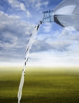 Pouring water against the nature background, Freshness concept