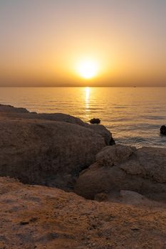 The sunset on the beach of Red Sea in Egypt . Charm an ale the Sheikh