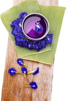 Welcome drink in Thai traditional style, The butterfly pea water in silver bowl 