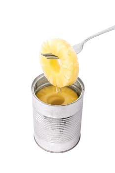 Slice of pineapple on a fork isolated