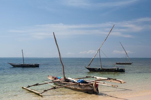 Old wooden arabian dhow - fishing boats -  in de ocean. Kenya, Africa 