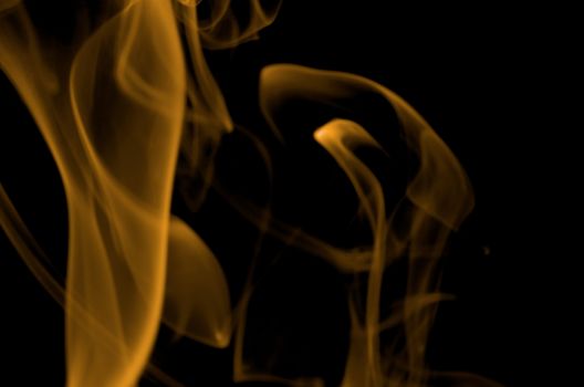 Abstract Orange Smoke Figures on Black background