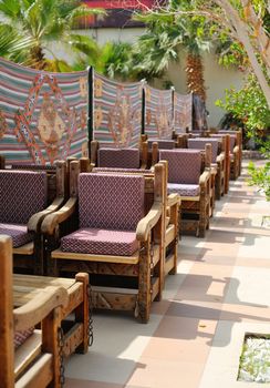 Cafe table on territory of hotel in Egypt. Arabic style.