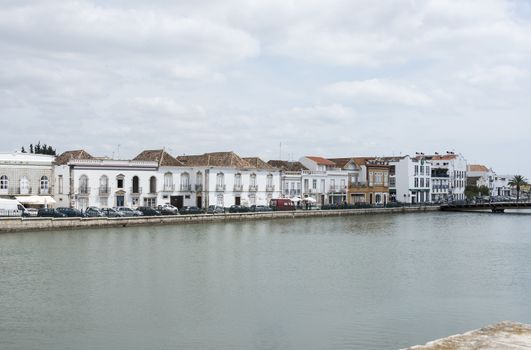 TAVIRA,PORTUGAL-APRIL17, 2015: view on the old houses and bridge of the old town Tavira in the south of Portugal on April 17 2015,This town is one of the oldest towns in Portugal in the Algarve