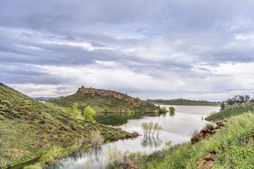 mountain lake at springtime with high water level - Horsetooth Reservoir near Fort Collins, Colorado