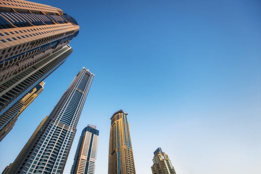 high beautiful skyscrapers on blue sky background.