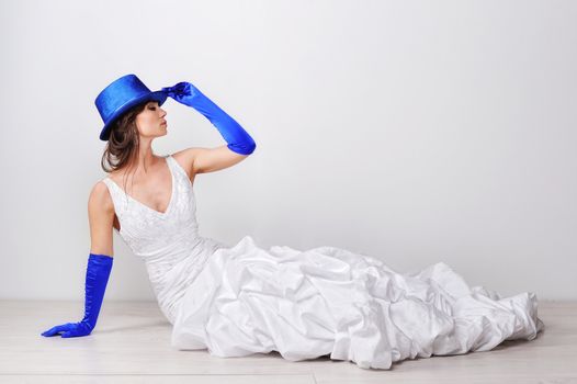 Portrait of elegant woman with blue hat.