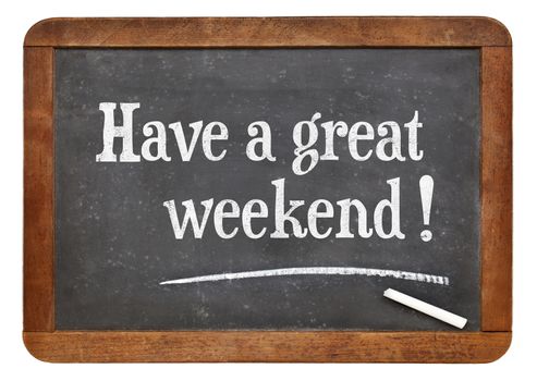 have a great weekend  - white chalk text on a vintage slate blackboard