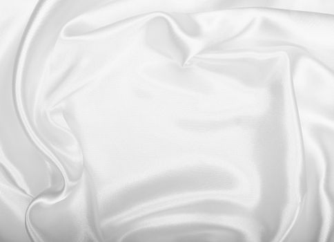 Smooth elegant white silk or satin texture can use as wedding background