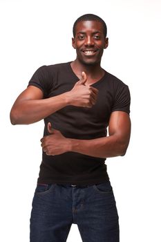 Closeup portrait of handsome young black african smiling man, giving two thumbs up, isolated on white background. Positive human emotions 