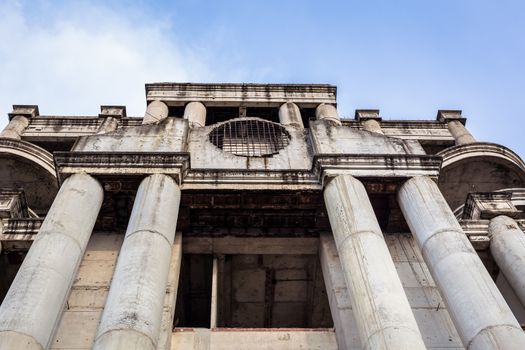 abandoned building can use horror movie scene background, low angle shot