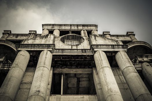 abandoned building can use horror movie scene background, low angle shot