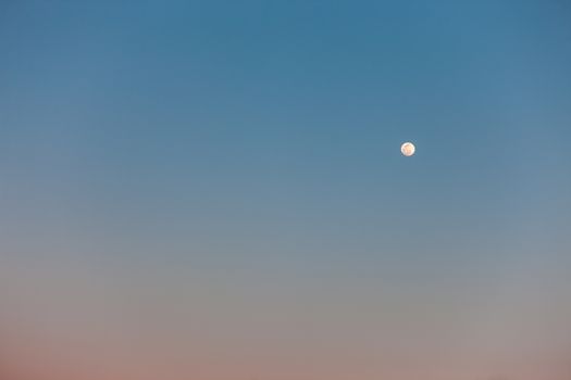  The Full Moon in daylight blue sky