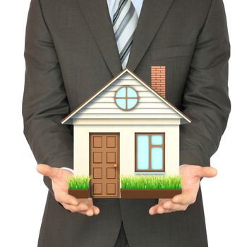 Man in suit holding house on isolated white background
