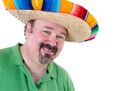 Close up Welcoming Bearded Man in Mexican Sombrero Smiling at the Camera on White Background with Copy Space.
