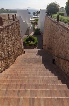 Stairs with steps leading to the sea and beach at the luxury hotel, Sharm el Sheikh, Egypt