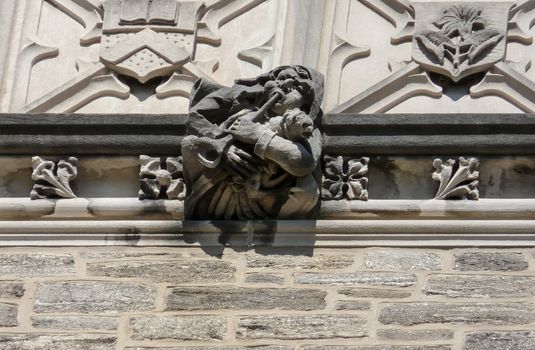 PRINCETON, NJ - October 20, 2013: Autumn in one of the best and oldest universities in USA, belonging to elite Ivy Leaque. Detailed view of high reliefs at the top of famous Blair Arch.