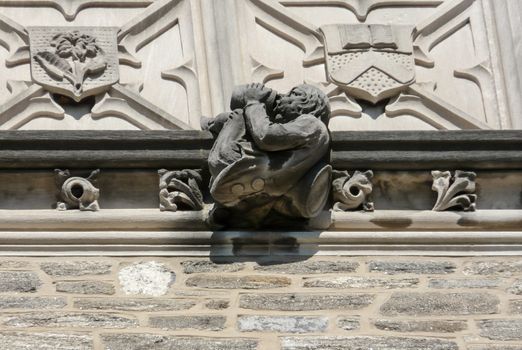 PRINCETON, NJ - October 20, 2013: Autumn in one of the best and oldest universities in USA, belonging to elite Ivy Leaque. Detailed view of high reliefs at the top of famous Blair Arch.