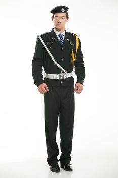 Create all kinds of work clothes policeman stands in front of a white background