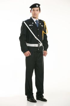 Create all kinds of work clothes policeman stands in front of a white background