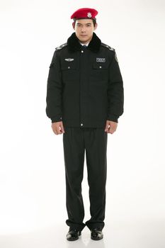 Create all kinds of work clothes policeman stands in front of a white background