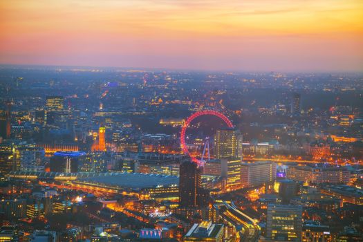 Aerial overview of London city at sunset