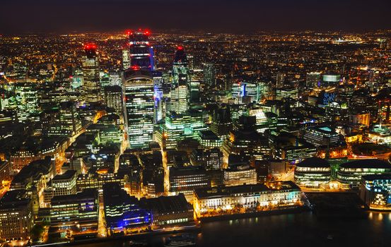 Aerial overview of the City of London financial ddistrict at night