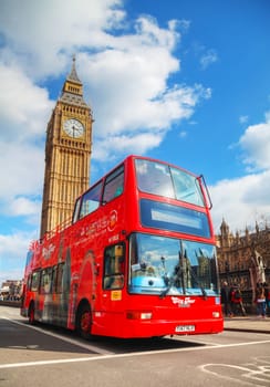 LONDON - APRIL 5: Iconic red double decker bus on April 5, 2015 in London, UK. The London Bus is one of London's principal icons, the archetypal red rear-entrance Routemaster recognised worldwide.