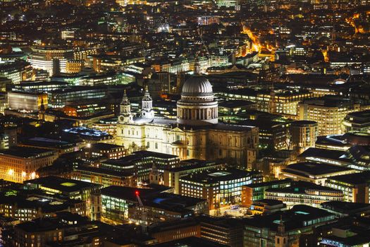 Aerial overview of London city with the St Pauls Cathedral at night